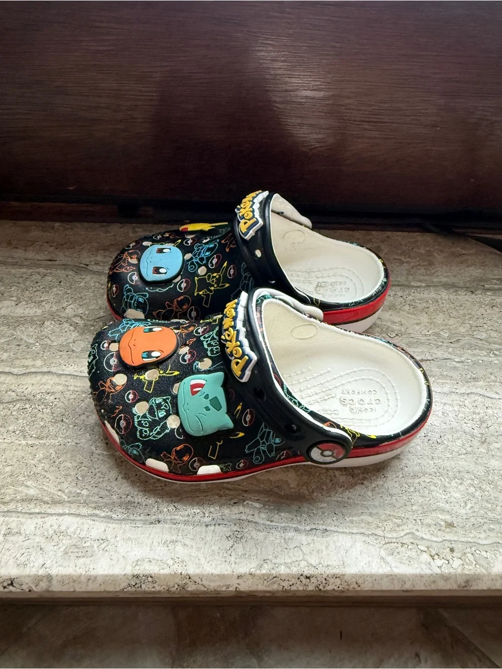 CROCS Black Kids' Pokémon Character Clogs with Yellow Blue Orange Green Accents